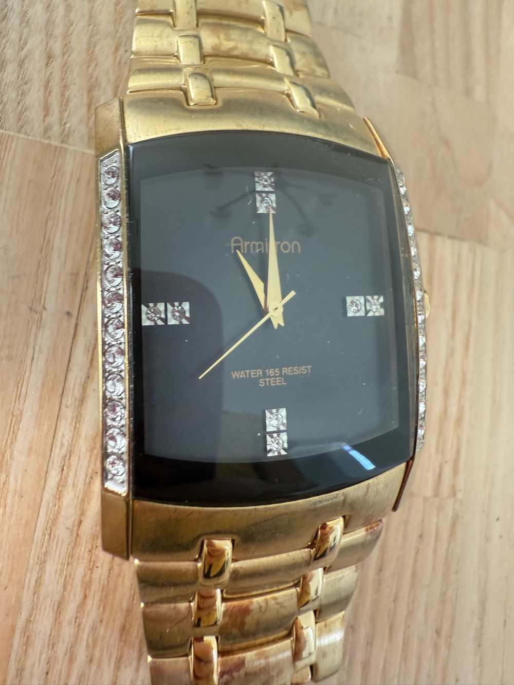 Armitron mens black dial gold tone watch NEW BATTERY